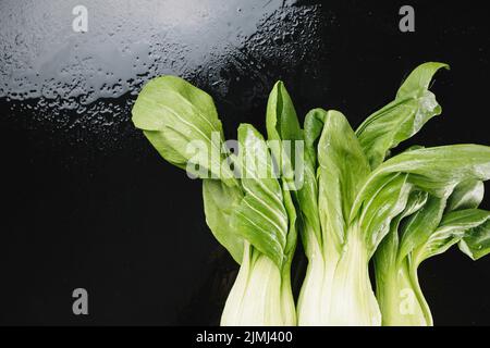 Bok choys sfondo umido Foto Stock