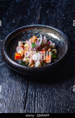 Piastra di fusione di ceviche primo piano Foto Stock