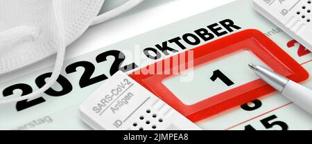 Calendario tedesco 2022 Oktober 1 Sabato con Corona Antigen Test e FFP2 maschera facciale Foto Stock