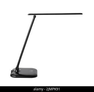 Moderna lampada da tavolo in plastica nera isolata su bianco. Foto Stock