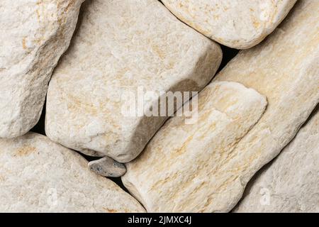 Primo piano della collezione di pietre bianche Foto Stock