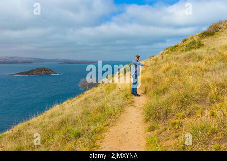 Andrew McIntyre, residente ad Adelaide in South Australia, è stato raffigurato presso il promontorio Rosetta Head sulla Encounter Bay a Victor Harbor, South Australia. Foto Stock