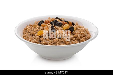 Ciotola di fiocchi di grano saraceno isolato su sfondo bianco Foto Stock