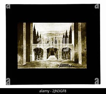 Scenico: Attraverso pareti laterali di vista sfalsata di un portale ad un cimitero Foto Stock