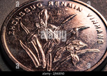 Primo piano di una moneta cinese Foto Stock
