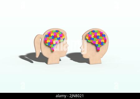 Puzzle a forma di cervello sulle teste di bambina e ragazzo, colori colorati, educazione dei bambini, sviluppo, salute mentale, Autismo, mente, 3D malati Foto Stock