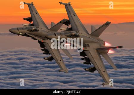 Boeing F / A-18E / F Super Hornet in volo sopra le nuvole Foto Stock