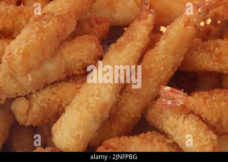 Gustosi bastoncini di granchio fritti in pastella Foto Stock