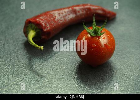 Poco pomodoro e peperoncino. Foto Stock