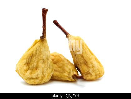 Isola di pera. Pera ed asciugato o appassito su sfondo bianco. Frutta Foto Stock