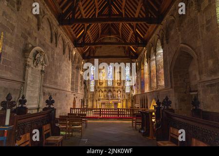 L'interno della chiesa del 12th ° secolo di St Aidan a Bambburgh, Northumberland, Inghilterra Foto Stock