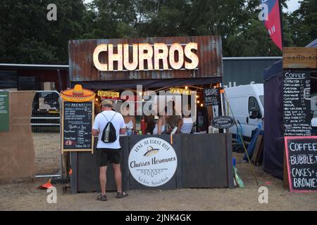 Latitude Festival 2022 luglio, Henham Park, Suffolk, Regno Unito. Stallo dei churros Foto Stock