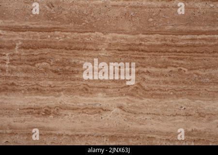 Tessuto nero travertino, sfondo marrone chiaro per un design d'ufficio rigoroso. Foto Stock