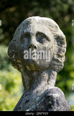 Immagine in pietra ornamentale di una testa femmina Foto Stock