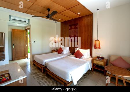 Ammira l'interno di una camera al Pax Ana Resort a 4 stelle a Doc Let Beach, Nha Trang, provincia di Khanh Hoa, VN Foto Stock