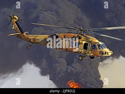 Assaf Ramon Crash An Israeli air force combat helicopter flies over the crash site of a F ...