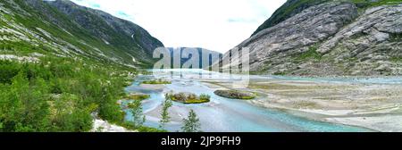 Jostedalsbreen ghiacciaio e fiume Nigardsbreen parte in Norvegia Europa con ghiaccio blu vista aerea extra ampio panorama Foto Stock