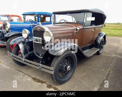 Vecchio marrone Ford modello A Phaeton Fordor quattro porte circa 1930. CADEAA MNA 2022 mostra auto classica. Foto Stock