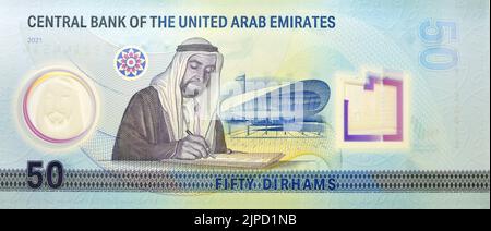 Grande frammento di lato opposto del nuovo polimero commemorativo 50 cinquanta Dirham degli Emirati Arabi Uniti con Sheikh Zayed bin Sultan al Nahyan firma l'un Foto Stock