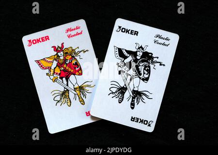 carte da gioco rivestite in plastica coppia di jokers Foto Stock