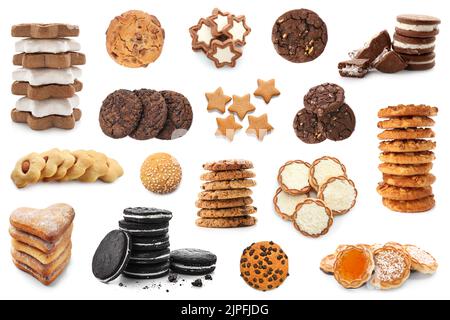 Set di dolci diversi isolati sul bianco Foto Stock