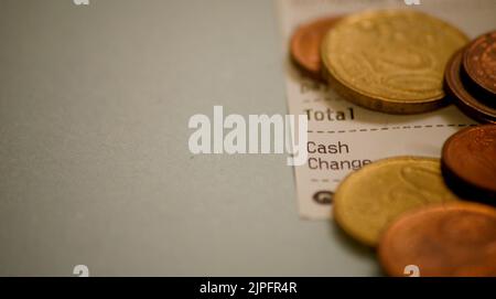 Cambio monete in euro sulla ricevuta Foto Stock