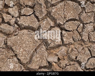 Grande consistenza di terreno bruno parched dal riscaldamento globale Foto Stock