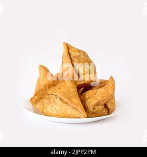 Cibo di strada indiano - Samosa Foto Stock
