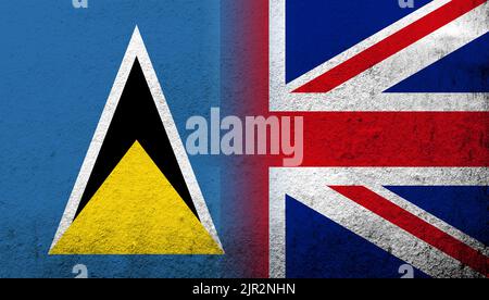 Bandiera nazionale del Regno Unito (Gran Bretagna) Union Jack con bandiera nazionale di Santa Lucia. Sfondo grunge Foto Stock