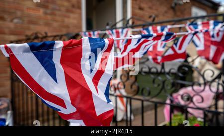 Union Jack la Gran Bretagna sventolava per una celebrazione Foto Stock