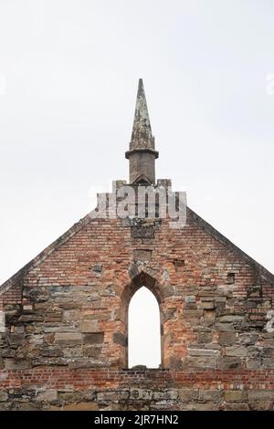 Questa vecchia torre della chiesa si trova a Port Arthur in Tasmania. Costruito a mano Foto Stock