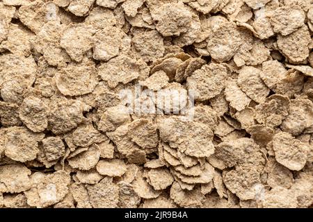 Fiocchi di cereale di grano intero. Cereali integrali per la colazione. Vista dall'alto. Foto Stock