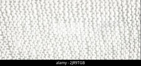 Tessuto a maglia bianco caldo leggero, piatto. Caldo maglione fatto a mano in lana bianca. Foto Stock