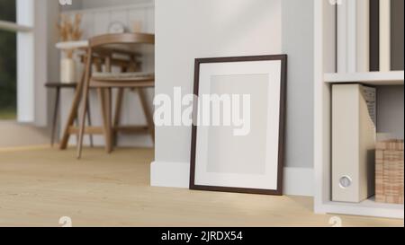 Un minimal frame poster mockup si trova su un pavimento di legno minimale sopra la parete bianca in un soggiorno scandinavo minimale. rendering 3d, illustrazione 3d Foto Stock