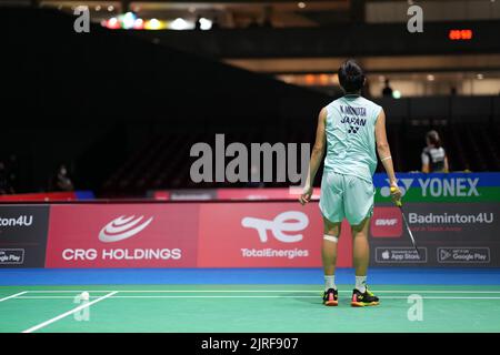 Tokyo, Giappone. 24th ago, 2022. Momota Kento del Giappone reagisce durante la seconda partita maschile contro Prannoy H. S. dell'India ai Campionati del mondo BWF 2022 a Tokyo, Giappone, 24 agosto 2022. Credit: Zhang Xiaoyu/Xinhua/Alamy Live News Foto Stock