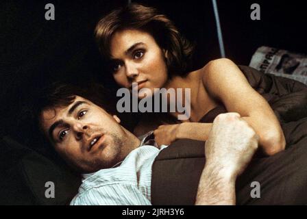 DAN AYKROYD, DONNA DIXON, Spie come noi, 1985 Foto Stock