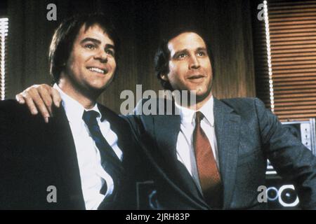 DAN AYKROYD, Chevy Chase, Spie come noi, 1985 Foto Stock