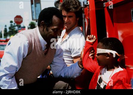 DANNY GLOVER, Mel Gibson, Arma letale, 1987 Foto Stock