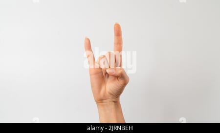 linguaggio dei segni dei sordi e muti, frase - rock and roll, rock on Foto Stock