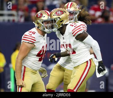 San Francisco 49ers long snapper Taybor Pepper (46) stands on the field  with punter Mitch Wishnowsky (18) before an NFL football game against the  Tampa Bay Buccaneers, Sunday, Dec.11, 2022, in Santa