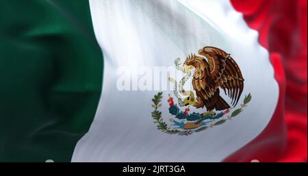 Vista ravvicinata della bandiera nazionale messicana che sventola nel vento. Il Messico è un paese nella parte meridionale del Nord America. Dorso in tessuto testurizzato Foto Stock