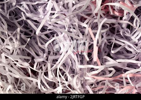 Texture lilla e spaghetti pastello viola carta da imballaggio grattugiata. Carta utilizzata per proteggere oggetti fragili durante il trasporto, riempire scatole regalo e confezioni regalo. Carta da parati e texture. Foto Stock