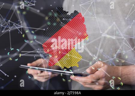 Una mappa del mondo resa 3D che si trova nella mano di mans Foto Stock