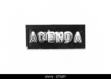 Banner di colore nero con lettera in rilievo con agenda di parole su sfondo bianco Foto Stock