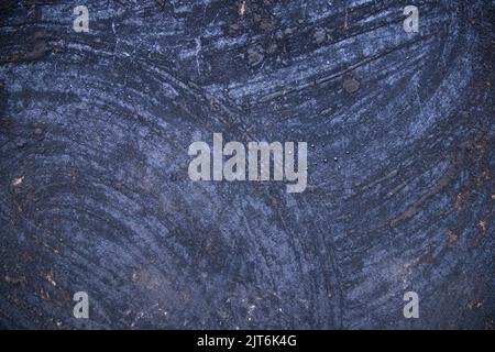 Vecchia superficie di metallo coperta cenere nera struttura astratta sfondo Foto Stock