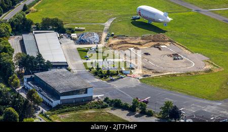 Fotografia aerea, aeroporto di Essen/Mülheim, Sparkasse Zeppelin, demolizione di un hangar di navi aeree, Haarzopf, Essen, zona della Ruhr, Renania settentrionale-Vestfalia, Germania, Foto Stock