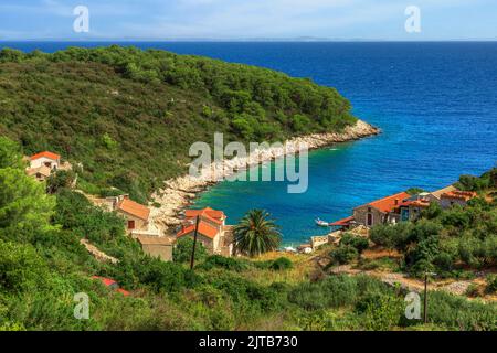 Spiaggia di Okljucna, Isola di Vis, Dalmazia, Croazia Foto Stock