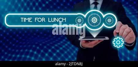 Scrittura con visualizzazione dell'ora del testo per il pranzo. Vetrina d'affari momento di avere un pasto pausa dal lavoro relax mangiare drink riposo Foto Stock