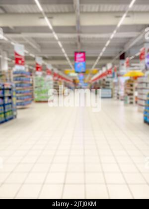 Astratto sfocato navate supermercato per sfondo. - foto di scorta Foto Stock