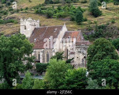 SANKT MICHAEL, AUSTRIA - 13 LUGLIO 2019: Vista esterna della chiesa fortificata di Wehrkirche San Michele visto dal Danubio Foto Stock